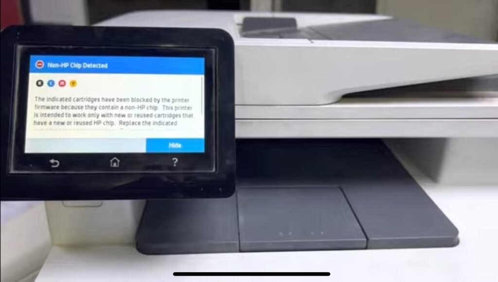HP Color LaserJet Pro showing non-HP chip error on screen
